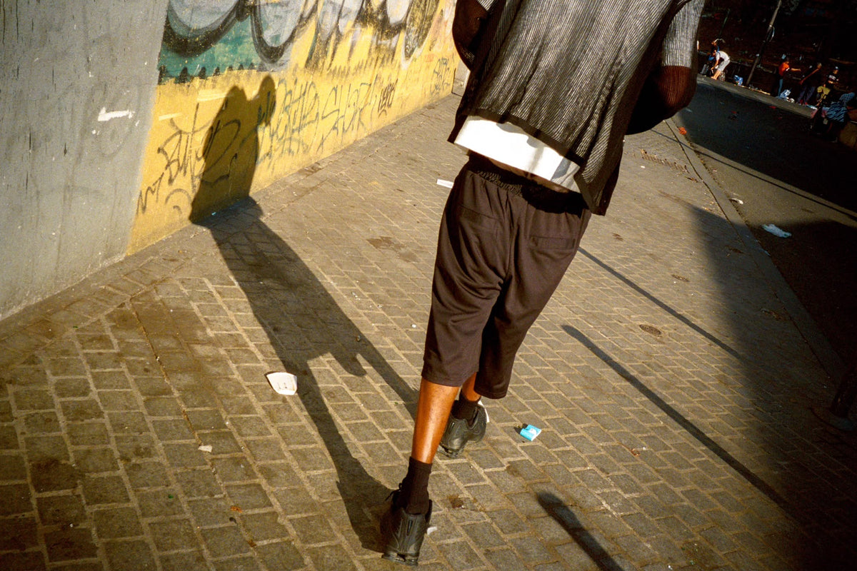 black shiny mesh short